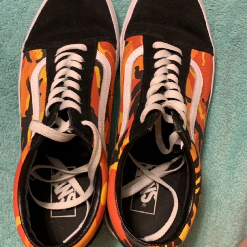Orange camo and black vans sneakers